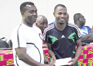 Sunday Ayodele from Nigeria beat Ghana's top seeds to win the ultimate prize