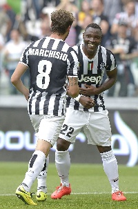 Ghana midfielder Kwadow Asamoah with Claudio Marchisio