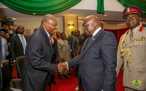 President Akufo-Addo in a handshake with Justice Atuguba