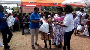 Executives of the NGO donating to the needy