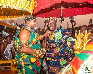 Ohempon Dr Yeboah Asiamah in a hanshake with Osagyefo Oseadeeyo Dr Agyemang Badu II