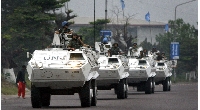 UN peacekeeping troops patrol the streets in armoured personnel carriers in DRC'S capital