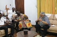 Rawlings interacting with head of Head of Adabraka Traditional Council