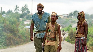 Abraham Attah and Idris Elba in Beasts of No Nation