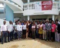 Dr Liz David-Barrett in a group photo with participants of a two-day training workshop