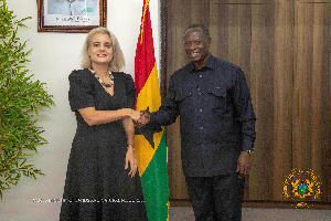 Emmanuel Armah-Kofi Buah (R) with the Swiss Ambassador (L) during their meeting