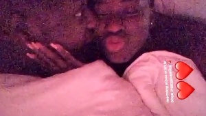 Rapper Medikal and his new lover Fella Makafui in bed smooching