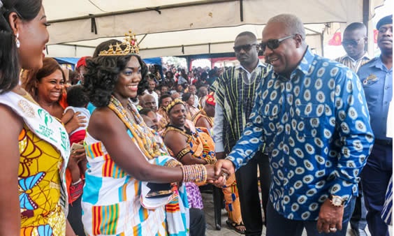 President Mahama in a handshake with Esi reigning queen of TV3