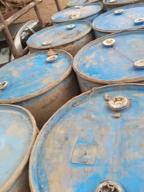 The intercepted cocoa beans stored in drums for smuggling