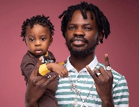Musician Fameye and his son