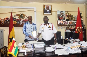 Chief Fire Office, Albert Brown Gaisie with Chief Executive Officer of Kazz group