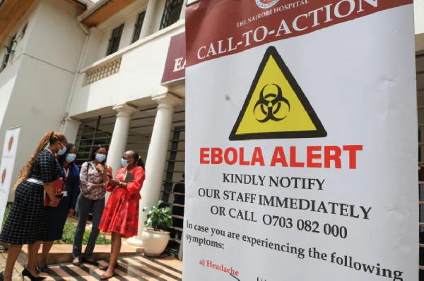 Kenyan health workers and officials outside an Ebola isolation facility in Nairobi