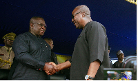 President Julius Maada Bio (L) and President John Dramani Mahama