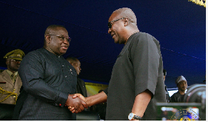 President Julius Maada Bio (L) and President John Dramani Mahama