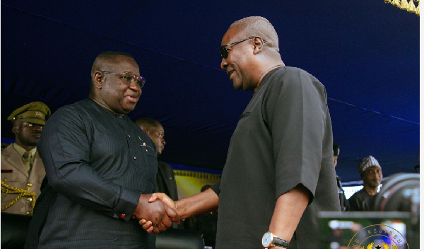 President Julius Maada Bio (L) and President John Dramani Mahama