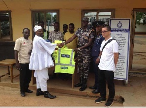 Representatives from Apsonic Motor Limited presenting the items to the Police