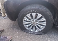 The front tyre of Vincent Odotei Sowah's car