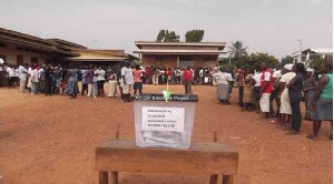 Electorates wait for their turn to vote at a polling station.