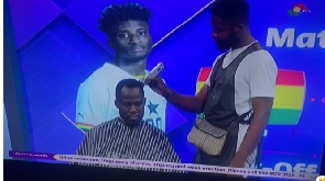Agyemang-Badu getting his hair cut on TV