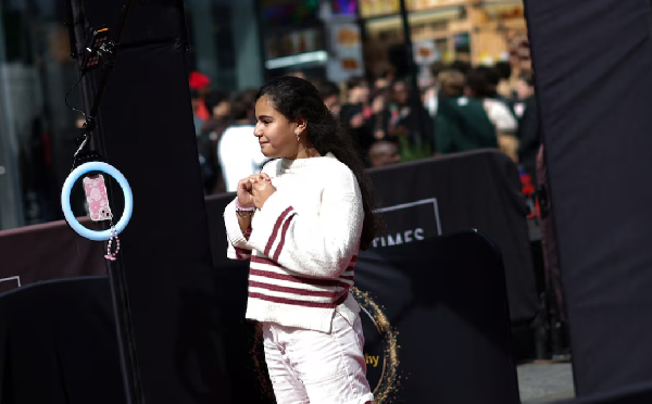 Woman creates 360° TikTok video in Times Square booth