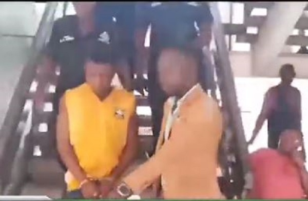 The man being whisked away from the court