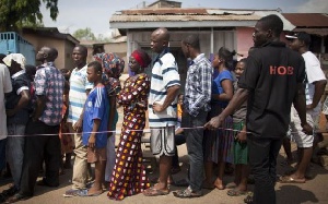 Voters queue to cast ballot