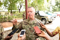 Colonel J. Osborn speaking to the media after the ceremony