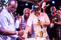 Staff of YFM cut a cake to crown the event