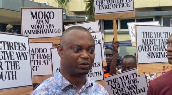 Some citizens wielding placards with various inscriptions