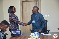 Obuobia meeting one of the heads at the private specialist hospitals