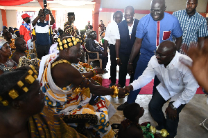 Dr. Mahamudu Bawumia greeting a chief during his tour