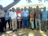 Emmanuel Armah Kofi-Buah in a group picture with some teachers from his constituency