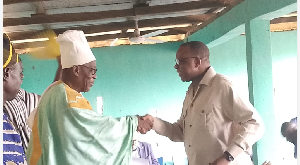 Jules-Armand Aniambossou, French Ambassador ( L)