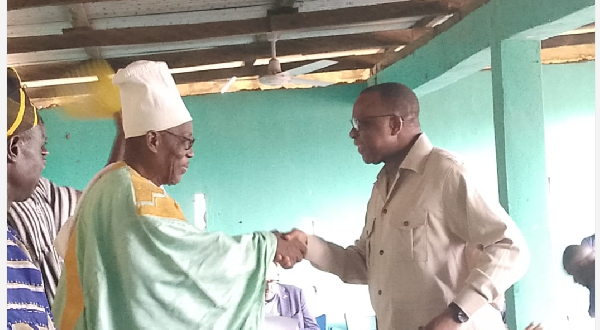 Jules-Armand Aniambossou, French Ambassador ( L)