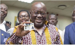 Nana Addo Dankwa Akufo-Addo, President of Ghana with his Ghana Card
