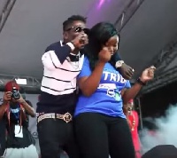 Shatta Wale and his sister on stage