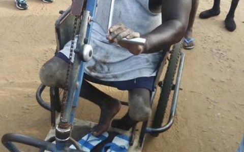 The cripple was beaten by the policemen irrespective of his plight