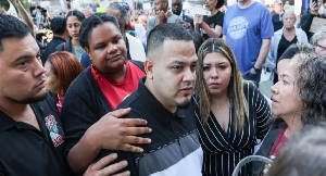 Abrego Garcia arrives at ICE field office, surrounded by supporters