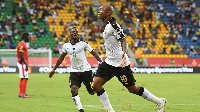 Wakaso and Dede Ayew celebrate a goal
