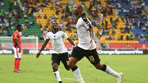 Wakaso and Dede Ayew celebrate a goal