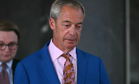 Nigel Farage leaves Millbank Tower after resigning on television