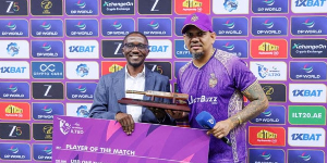 Jackson Kavuma hands over Player of the Match award to ADKR's Windies star Sunil Narine