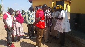 Staff of Vodafone Ghana at the premises of Regent of Tamale Dakpema, Sulemana Mohammed Alhassan Dawu