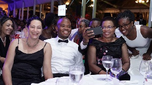 Fred Swaniker Celebrating an ALU anniversary with Graca Machel