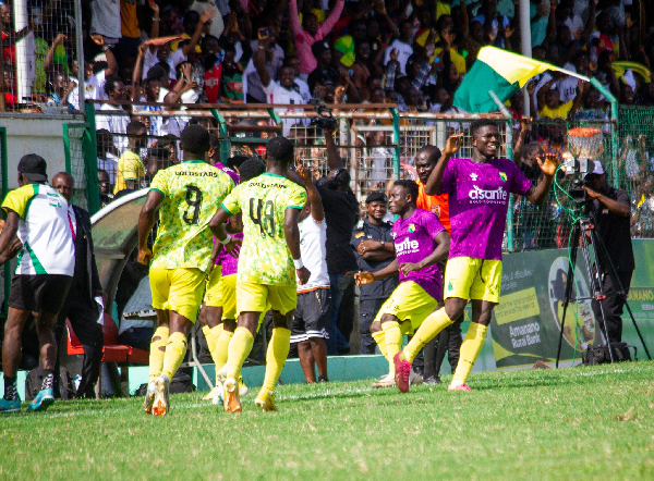 Players of Bibiani Gold Stars celebrating their triumph