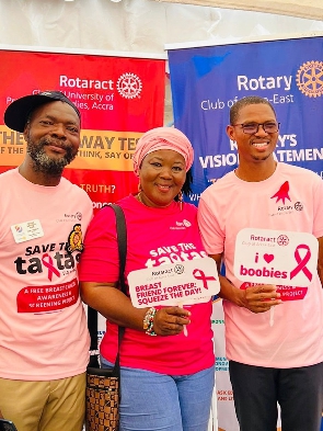 Rotarian president for Rotary Club of Accra-East, Serge Oga with Madina MP, Francis Sosu