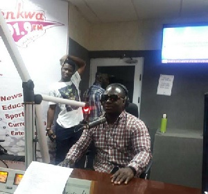 Otwinoko in the studio of Agyenkwa FM