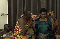 Nana Otuo Serebuo, Juabenhene, decorating wife of the Kabaka with 