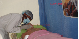A student demonstrates clinical skills during a raining and Health Care Conference 2026 in Jinja.