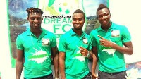 Some players of Dreams FC displaying shirts of Rich Dons Catering services